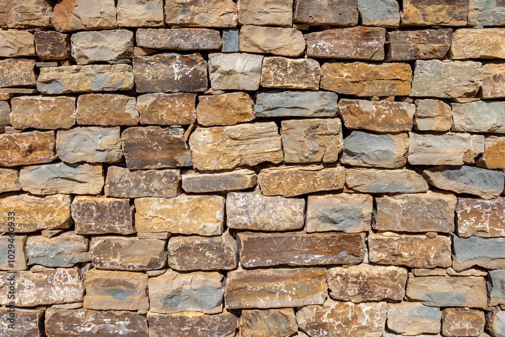 Block brick wall close up patterned background Block brick wall close up patterned background