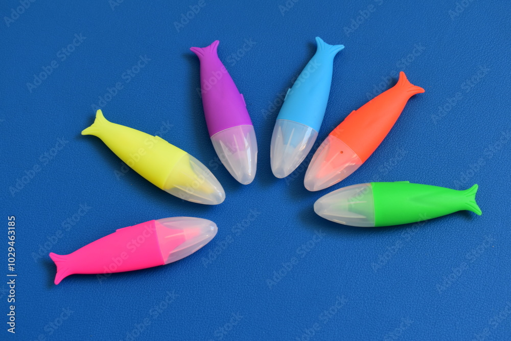 markers on a blue background markers on a blue background