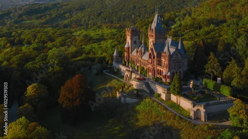 Aerial shot of the castle Drachenburg Siebengebirge at sunset near Bonn in Nord-Rhein Westfallen. Konigswinter photo