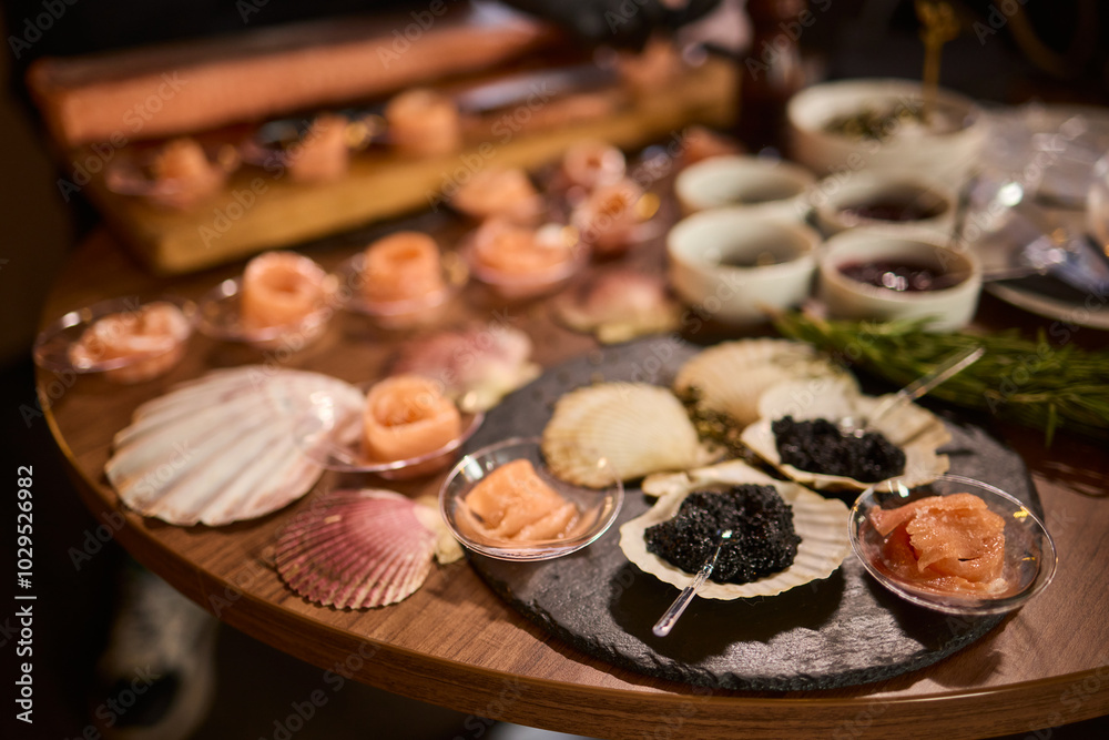 Enjoy a beautifully crafted Seafood Platter with various delicacies for a delightful experience Enjoy a beautifully crafted Seafood Platter with various delicacies for a delightful experience