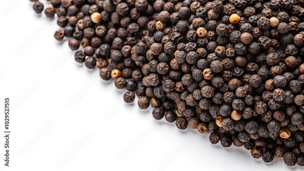 Panoramic view of black peppercorns on a white background with Indian dried spices Panoramic view of black peppercorns on a white background with Indian dried spices