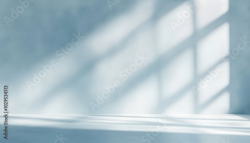 Wallpaper Mural Minimal abstract light blue background for product presentation. Shadow and light from windows on plaster wall. Torontodigital.ca