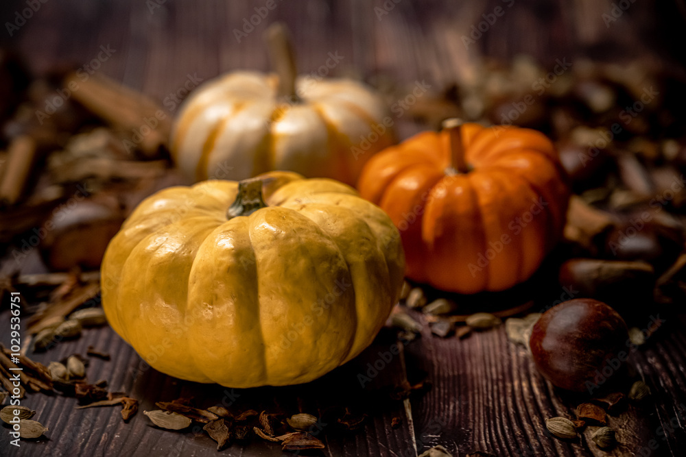 Pumpkins on Wooden Surface with Autumn Tones, Seeds. Pumpkins on Wooden Surface with Autumn Tones, Seeds.