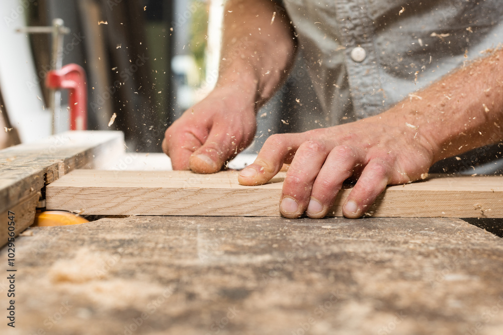 Milling of oak glued board and flying chips and dust Milling of oak glued board and flying chips and dust