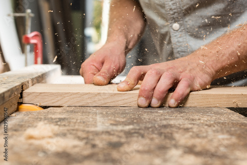 Milling of oak glued board and flying chips and dust