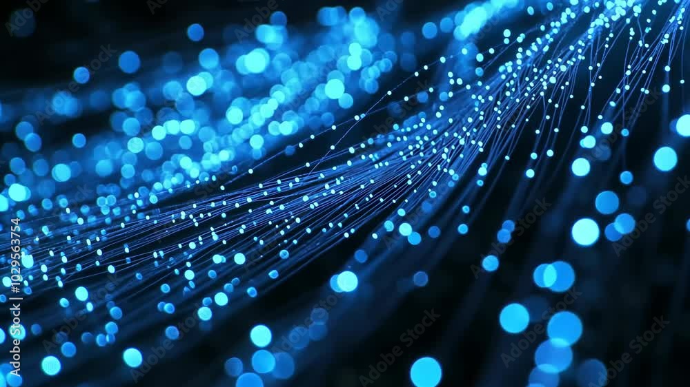 A close-up view of glowing blue lights, creating an abstract pattern on a dark background