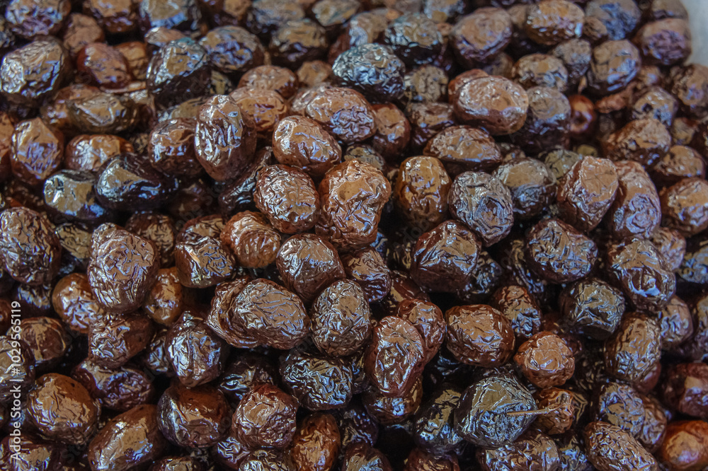 Delicious Dried Dates Piled High, Showcasing a Rich Variety of Textures and Hues, Perfect for Snacking or Culinary Delights Delicious Dried Dates Piled High, Showcasing a Rich Variety of Textures and Hues, Perfect for Snacking or Culinary Delights