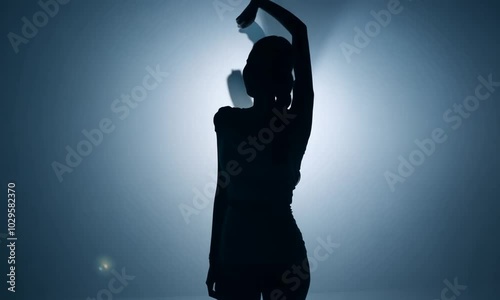 silhouette of a person, model posing in studio	