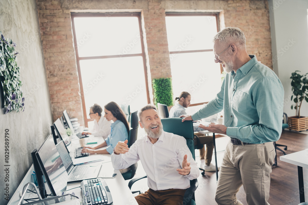 Photo of coworking project teamwork people mature men discussion work together conference meeting successful nice light office Photo of coworking project teamwork people mature men discussion work together conference meeting successful nice light office