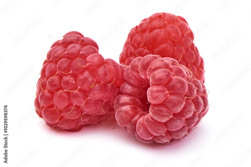 Fresh raspberries, isolated on white background.
