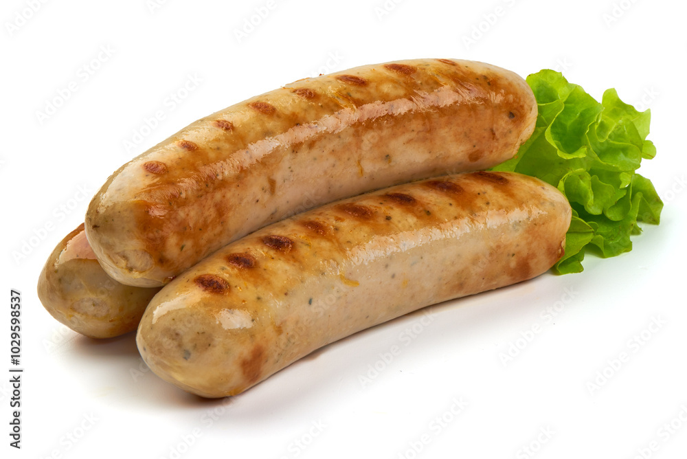 Grilled sausages with lettuce, isolated on white background. Grilled sausages with lettuce, isolated on white background.