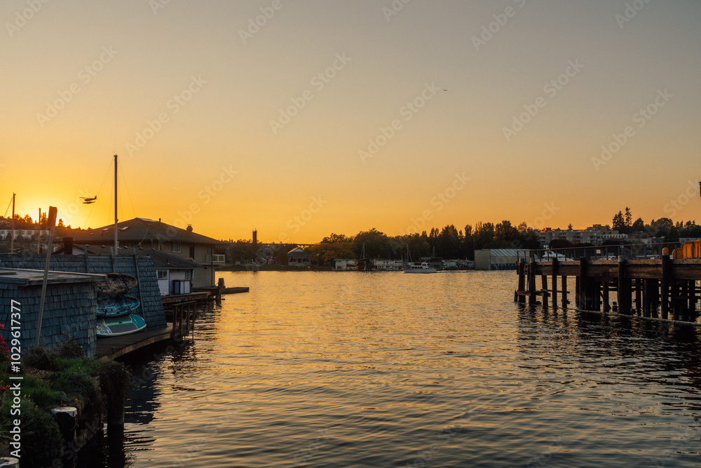 sunset in the harbor with seaplane landing, Lake Union, Seattle sunset in the harbor with seaplane landing, Lake Union, Seattle