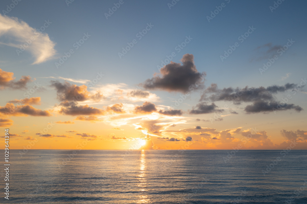 Cloudy sky on sea sunset, sunrise on ocean beach. Sunset landscape in the sky after sunset. Sunrise with clouds of different colors against the sky and sea. Cloudy sky on sea sunset, sunrise on ocean beach. Sunset landscape in the sky after sunset. Sunrise with clouds of different colors against the sky and sea.