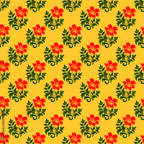 A vibrant yellow background features repeating red flowers and green leaves, creating a cheerful floral pattern perfect for textiles or decorative designs.