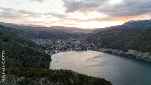 Sunrise over the valley of San Martín de los Andes, featuring the beautiful Lake Lácar, the city of San Martín de los Andes, and the Andes mountains in the background.