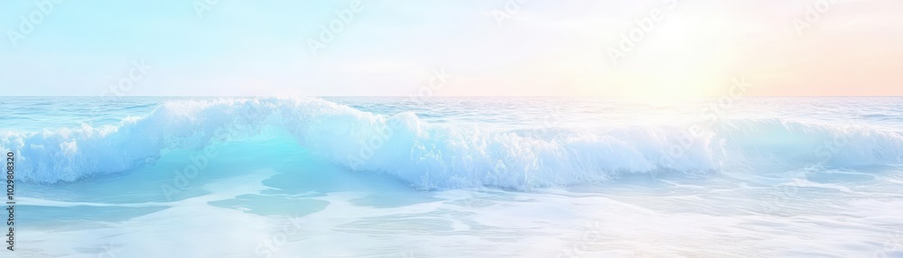 The ocean is calm and the sun is setting. The water is a beautiful shade of blue. The sky is a mix of blue and pink The ocean is calm and the sun is setting. The water is a beautiful shade of blue. The sky is a mix of blue and pink