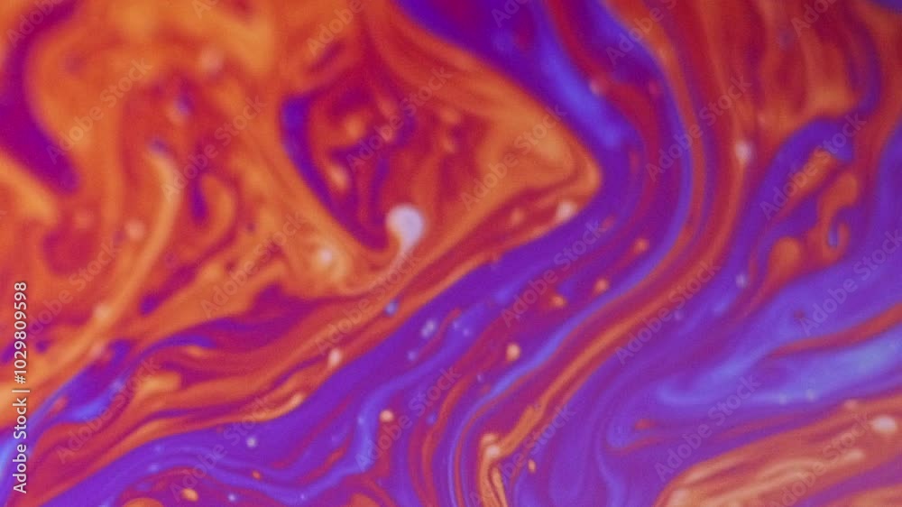 Psychedelic paint. Blur ink mix. Defocused blue orange color acrylic dye blend wave flow motion spectrum abstract art background. Psychedelic paint. Blur ink mix. Defocused blue orange color acrylic dye blend wave flow motion spectrum abstract art background.