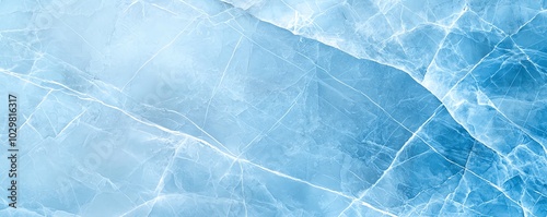 A close-up view of beautiful blue ice with intricate patterns, perfect for backgrounds, designs, and artistic projects.