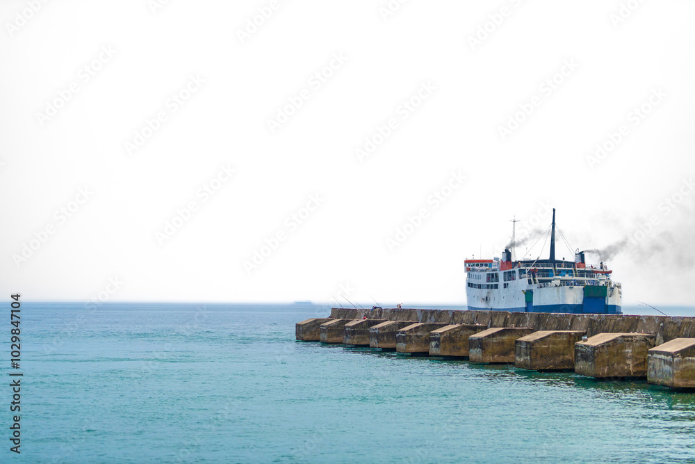 Ocean Giant by the Coast. Capturing Beauty on a Sunny Day. Large passenger ferry boat sailing the ocean. Ocean Giant by the Coast. Capturing Beauty on a Sunny Day. Large passenger ferry boat sailing the ocean.