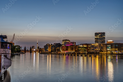 The river Spree in Berlin with the famous TV Tower in the back at twilight