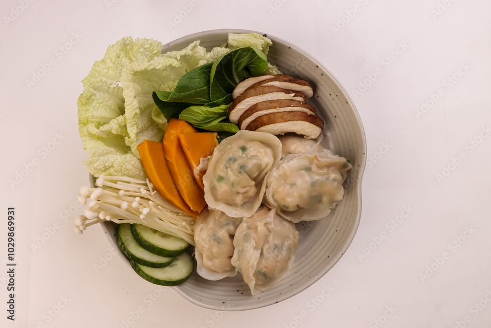 Mandu or Korean Dumpling Served with Vegetables. Mandu or Korean Dumpling Served with Vegetables.