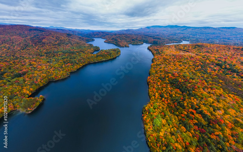 Aerial View Waterbury Vermont Lake in Fall Foliage Wide Landscape Drone Birds Eye View. Autumn Season Beautiful Nature Reservoir in New England photo