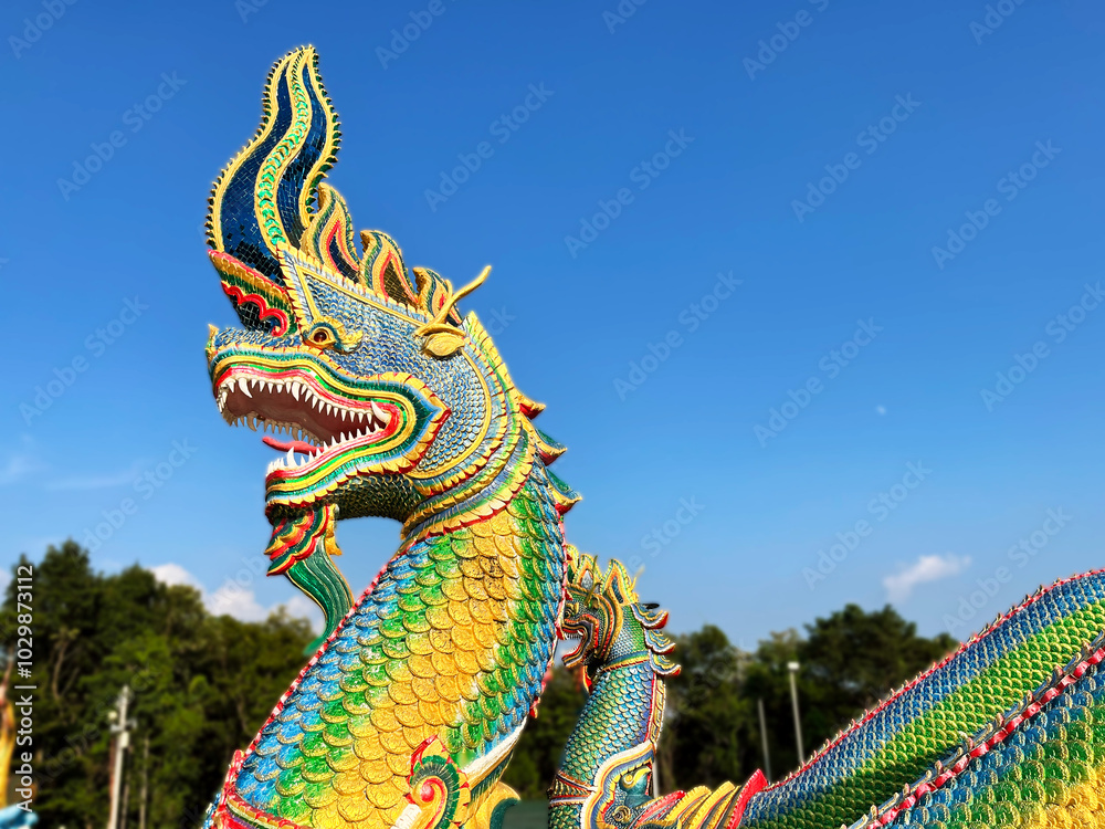 Naga King with Buddha Statue Beautiful Naga Statue, chinese dragon statue in temple, Thai dragon or serpent king statue Naga King with Buddha Statue Beautiful Naga Statue, chinese dragon statue in temple, Thai dragon or serpent king statue