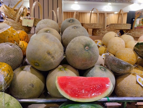 Various kinds of fresh fruit on display in the supermarket   photo