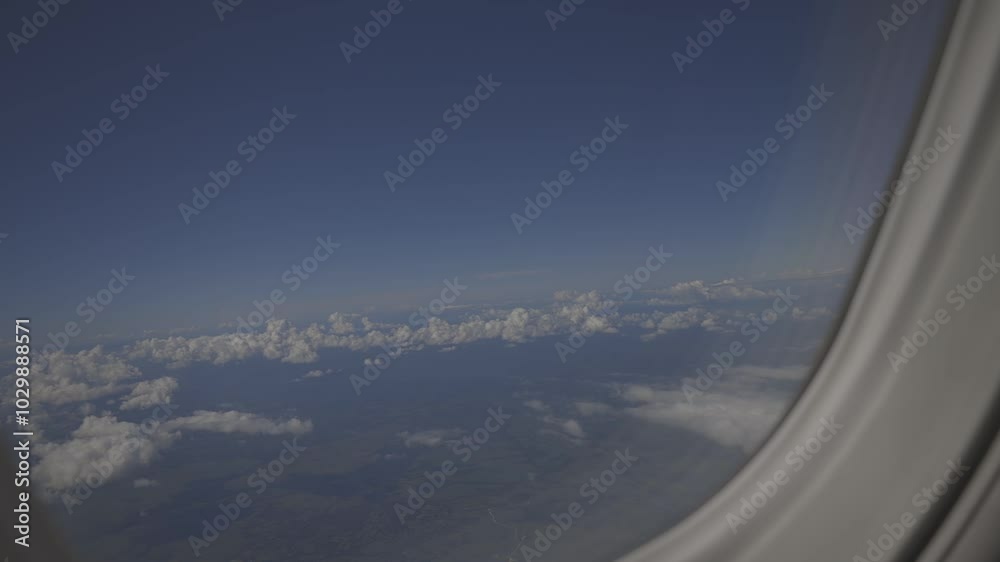 view from an airplane window, beautiful white clouds from above, captured canon eos R, raw c-log 8bits colour. view from an airplane window, beautiful white clouds from above, captured canon eos R, raw c-log 8bits colour.