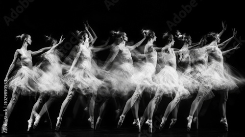 black and white long exposure photo of a group of ballet dancers with motion blur