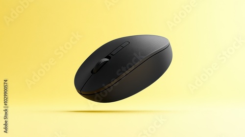 Compact Wireless Mouse Against Bright Yellow Background