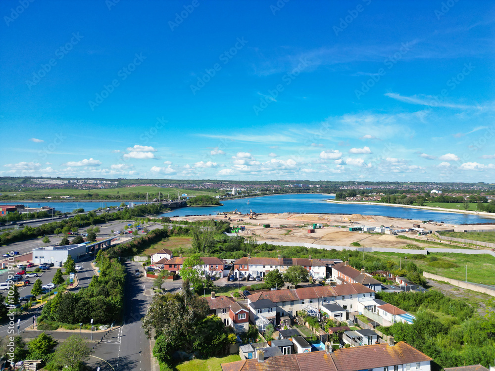 Fototapeta premium High Angle View of Portsmouth City Centre Located at Beach and Docks of England United Kingdom. Image Was Captured with Drone's Camera on May 15th, 2024.
