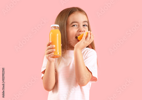 Cute little girl with bottl...