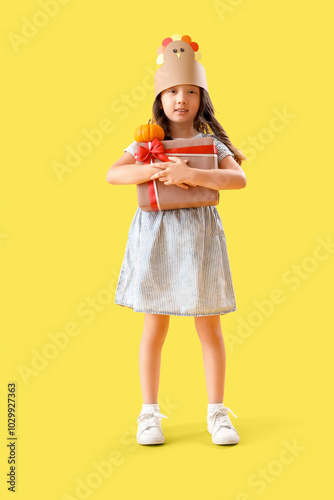 Cute little girl with gift ...