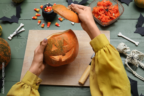 Woman with carved Halloween...
