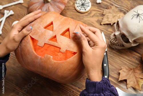 Woman with carved Halloween...