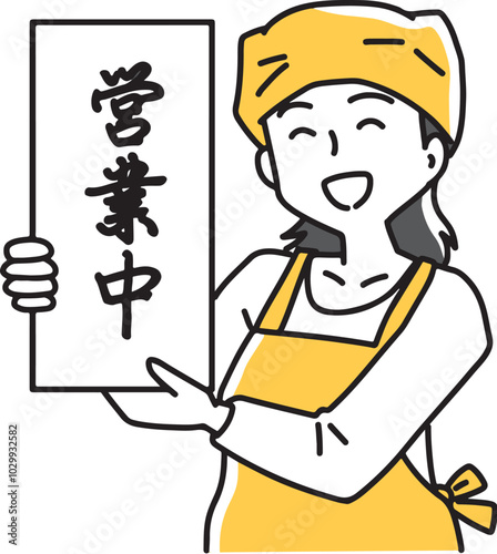 営業中の看板を見せる女性店員