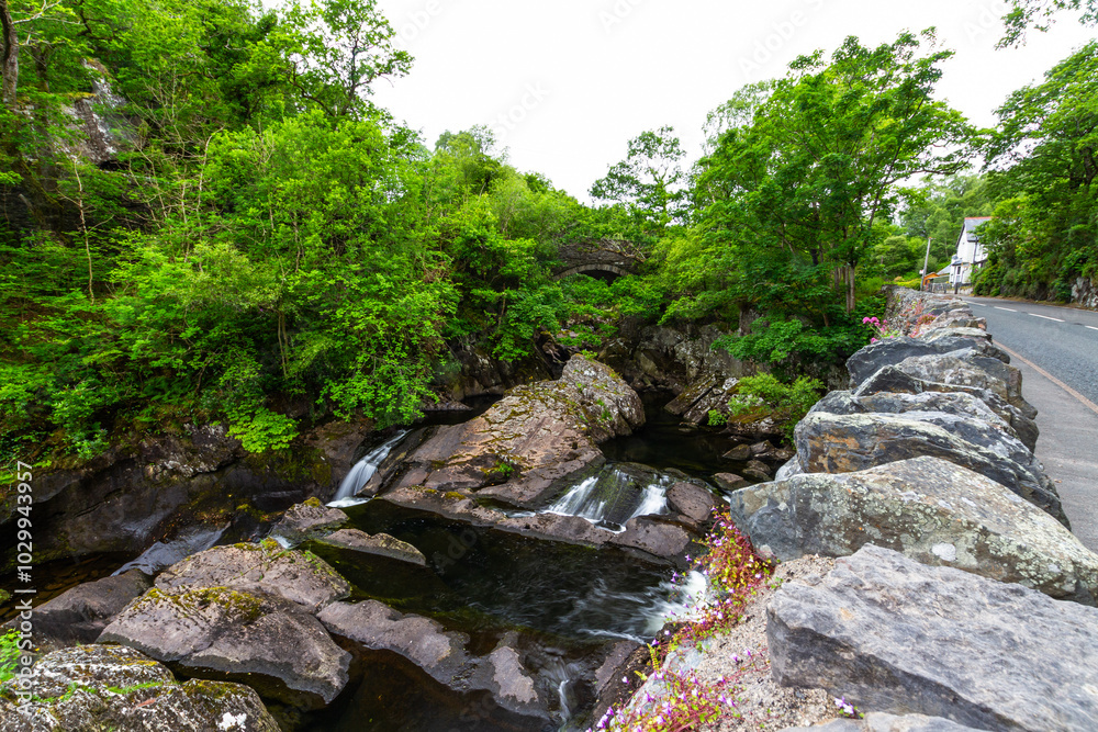 Cyfyng falls, waterfalls at Pont Cyfyng near Capel Curig, wall in foreground. Cyfyng falls, waterfalls at Pont Cyfyng near Capel Curig, wall in foreground.