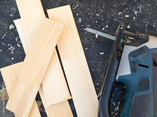 jigsaw on table, saw blade close-up