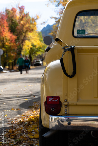 Vintage Yellow Truck In The Fall photo