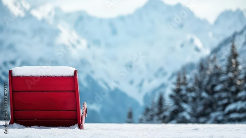 Fototapeta Naklejka Na Ścianę i Meble -  Red sleigh with snowy landscape background, Christmas scene in the mountains, winter holiday setting