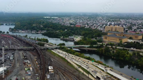 Aerial tracking shot of traffic on the Schuylkill Expy, cloudy day in Philadelphia photo