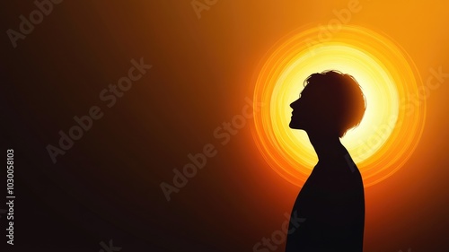 Silhouette of person with vivid sunset background