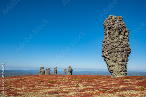 Discover the majestic manpupuner pillars in russia's komi republic, standing tall in the ural mountains