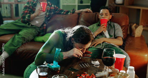 People, house party and woman with cocaine, night and illegal substance with alcohol. Group, event and evening with man, friends and addiction with credit card, powder and crime with drugs in lounge