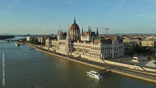 Aerial around view of Budapest city and Hungarian Parliament building on Danube river, Hungary, 4k