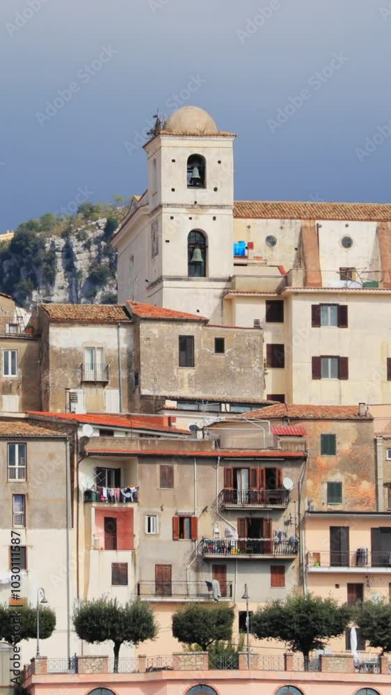Monte San Biagio, Italy. Top View Of Residential Area. Cityscape In Autumn Day Under Blue Cloudy Sky Monte San Biagio, Italy. Top View Of Residential Area. Cityscape In Autumn Day Under Blue Cloudy Sky