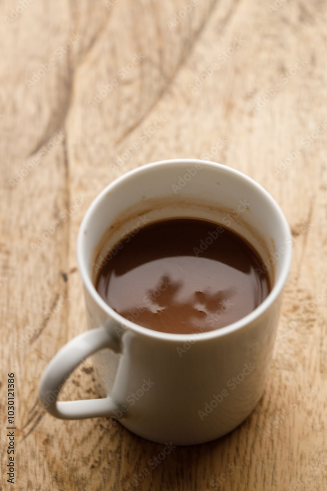 Cup of hot chocolate in white cereamic cup Cup of hot chocolate in white cereamic cup