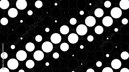 Abstract polka dot pattern featuring various sizes of white circles on black background. Bold and timeless. The simple yet striking design creates a playful and modern visual effect. 4K Seamless loop