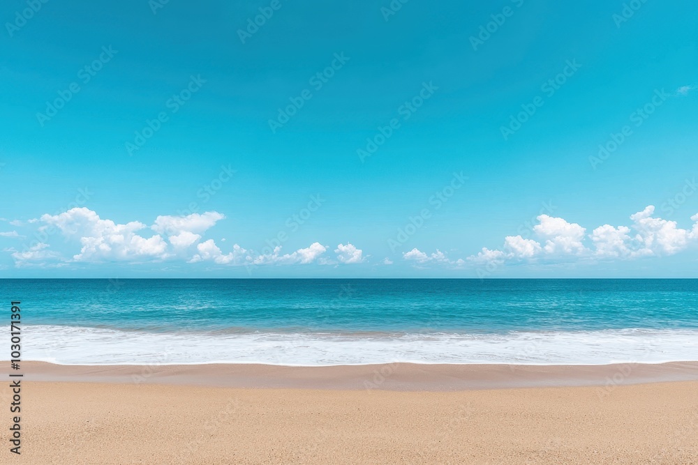 Calm tropical beach with gentle waves and blue sky on a sunny day Calm tropical beach with gentle waves and blue sky on a sunny day